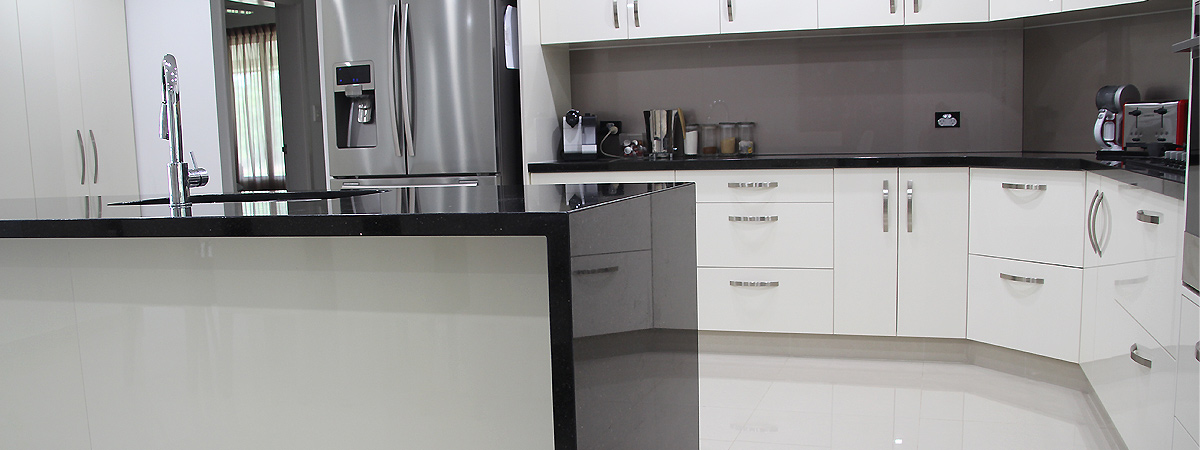 Kitchen island bench with stone waterfall bench tops