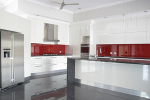 Red glass splash back, aluminium kickers, Darwin